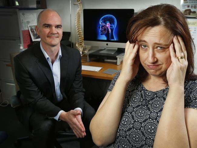 Cindy Stephenson with Melbourne Headache Centre headache consultant and director Roger O'Toole. Picture: David Caird