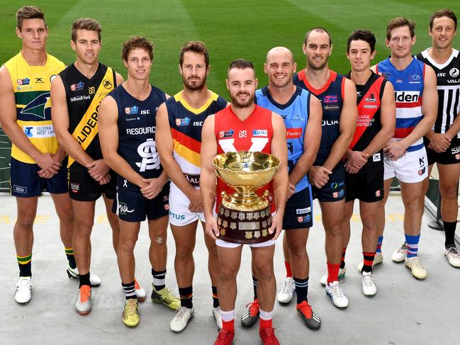 SANFL captains L-R Luke Thompson (Eagles),Chris Curran (Glenelg),Matt Rose (South Adelaide), Matthew Wright (Adelaide),Max Thring (North Adelaide),Zane Kirkwood (Sturt),Jace Bode (Norwood),Hugh Haysman (West Adelaide), Trent Goodrem (Central District) and Cam Sutcliffe (Port Adelaide)  pose for a photo with the Cup at Adelaide Oval Tuesday March 26,2019.(Image AAP/Mark Brake)