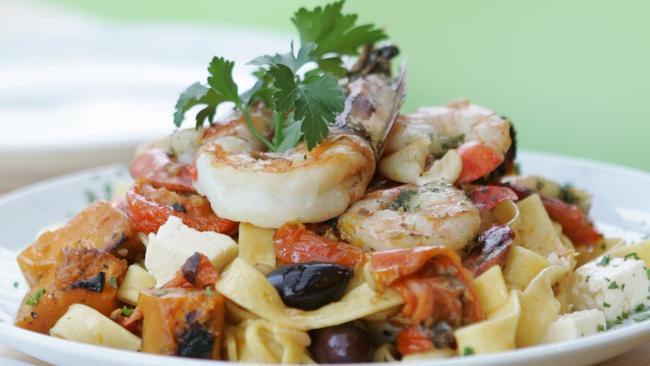 Alfresco on Elston’s fettuccine with olive oil, prawns, fetta and sun-dried tomatoes.