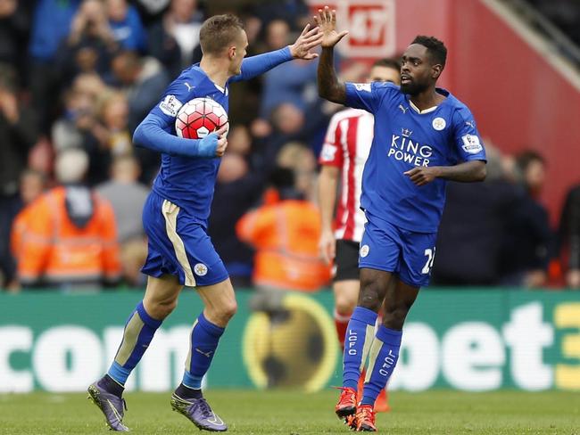 Leicester City's Jamie Vardy, left, celebrates scoringa goal with teammate Nathan Dyer.