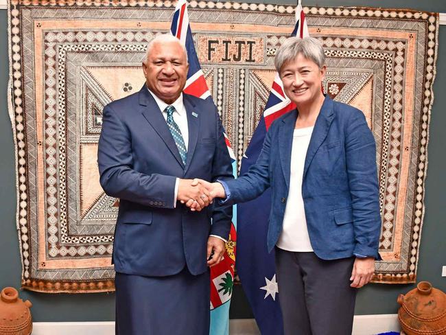 Fiji Prime Minister Frank Bainimarama greets Penny Wong. Picture: Twitter