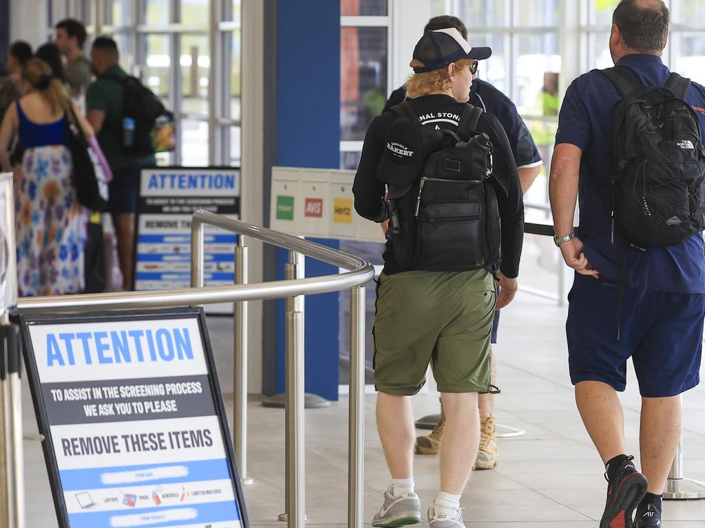 Sheeran made his way through airport security with the rest of the Virgin customers. Picture: Media-Mode.Com