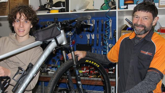 WHEELY GOOD: Year 10 Woodlawn student Oscar Murchison, 15, said he really loved undertaking a week's work experience as a bike mechanic with Harris Cycles proprietor, Darryl Pursey. Photo: Alison Paterson