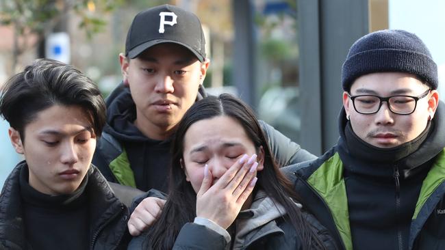 Mr Tran’s girlfriend Trish and his friends. Picture: David Crosling