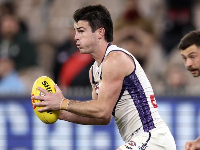 Andrew Brayshaw of the Dockers runs with the ball during the round 21 AFL match. Picture: Martin Keep/AFL Photos/via Getty Image.