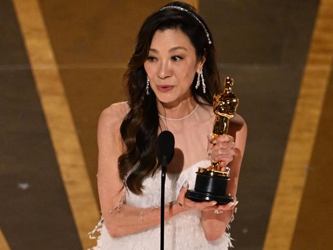 Malaysian actress Michelle Yeoh accepts the Oscar for Best Actress in a Leading Role for Everything Everywhere All at Once. Picture: Patrick T. Fallon / AFP