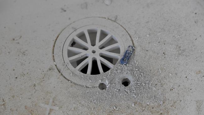 Holes have been drilled in shower bases and baths.