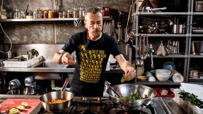 Adelaide chef Simon Bryant with lentils and chickpeas at his home. Picture: Matt Turner.