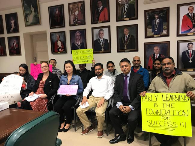 Parents of Integricare Homebush West at a council meeting on August 6.