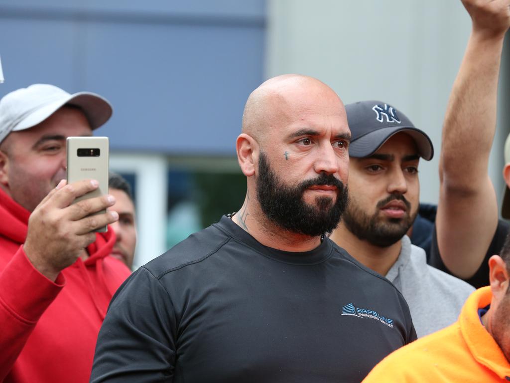 Protestors have begun to gather outside Kiis FM headquarters in North Ryde to protest against comments Kyle Sandilands made about Christians and the Virgin Mary. Protest leader Georgie Mark speaks to the protestors. Picture: David Swift.