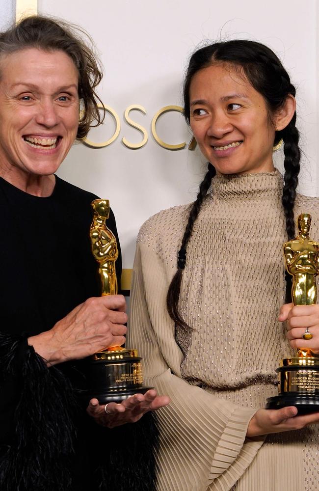 Producers Frances McDormand and and Chloe Zhao, hold the Best Picture award for "Nomadland". Picture: Getty