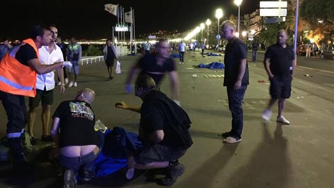 Locals and emergency services attempt to help the injured following the attack. Picture: Twitter