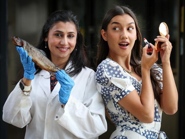 Future Victoria - Fish Cosmetics. Researchers are using fish guts, scales etc to develop cosmetics and collagen. Swinburne University Academic Director and Team Leader for Smart Materials Nisa Salim with the fish product and Jasmine Ng using the finished product.                                                               Picture: David Caird