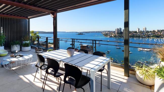 Her new seventh-floor Pomeroy apartment offers glorious views of the harbour.