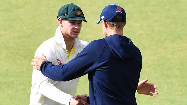 Australian captain Steve Smith (left) shakes hands with England captain Joe Root after the match.