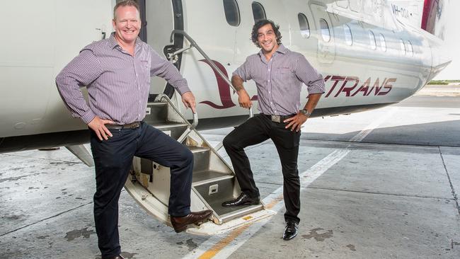 Skytrans owners Peter Collings and NRL star Johnathan Thurston. Photo: Skytrans