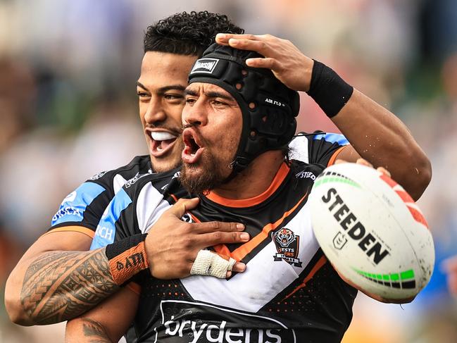 TAMWORTH, AUSTRALIA - MAY 11: Isaiah Papali'i of the Tigers celebrates a try with team mates during the round 10 NRL match between Wests Tigers and Newcastle Knights at Scully Park, on May 11, 2024, in Tamworth, Australia. (Photo by Mark Evans/Getty Images)