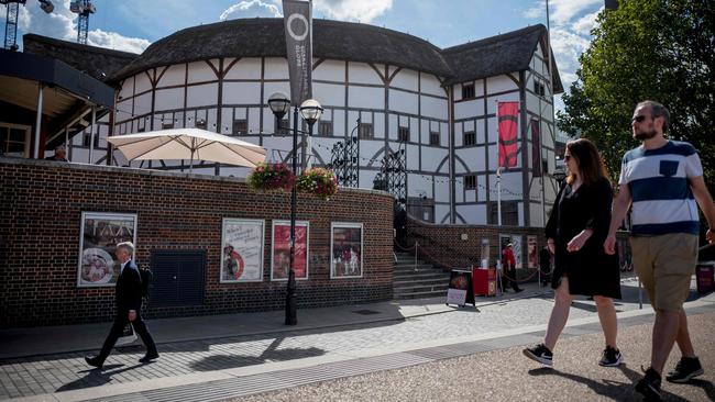 People walk past Shakespeare's Globe theatre in central London. Picture: AFP