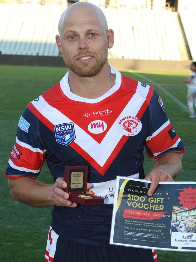 Camden captain-coach Brad Speechley with his player of the match awards. Picture Warren Gannon Photography