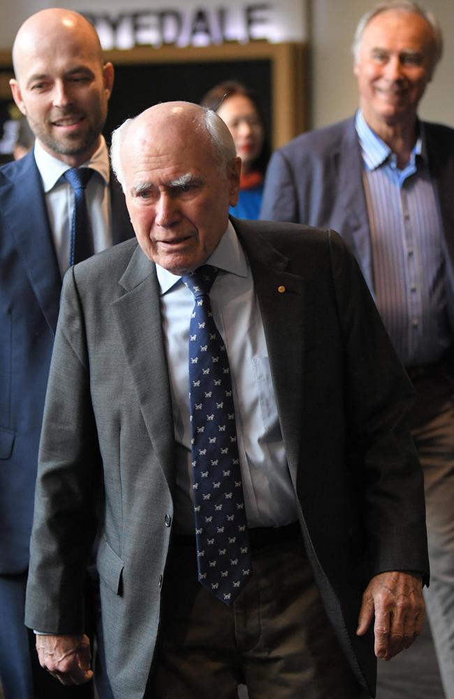 Former Australian Prime Minister John Howard making his campaign debut for the Liberal Bennelong candidate Simon Kennedy (left) with former member for Bennelong John Alexander (right) Picture: NCA NewsWire / Simon Bullard