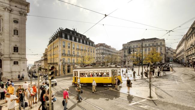 Trams still rumble through the streets of Lisbon.