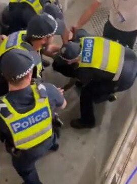 Police tackled a Victory fan to the ground during the derby on February 18.