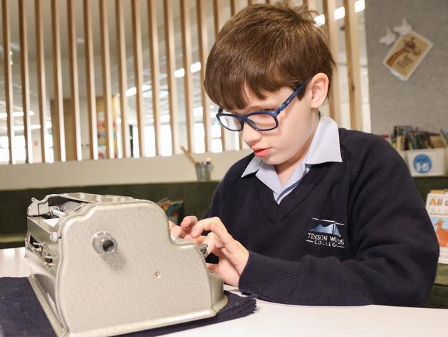 Vision-impaired Declan Lee used his special braille writer to participate in the school round of the Prime Minister's Spelling Bee with the help of his teaching team. Picture: supplied