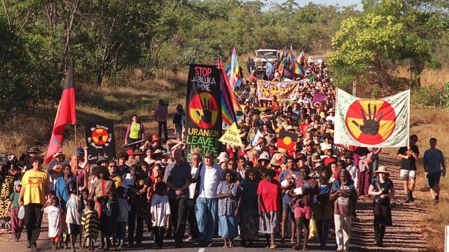 Protesters joined by Midnight Oil frontman and later federal Labor MP Peter Garrett, and traditional owners, march against the Jabiluka mine in 1998.