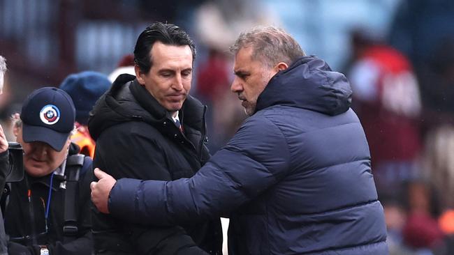 Unai Emery, Manager of Aston Villa, and Ange Postecoglou, Manager of Tottenham Hotspur, interact after the 4-0 result. Photo by Catherine Ivill/Getty Images.