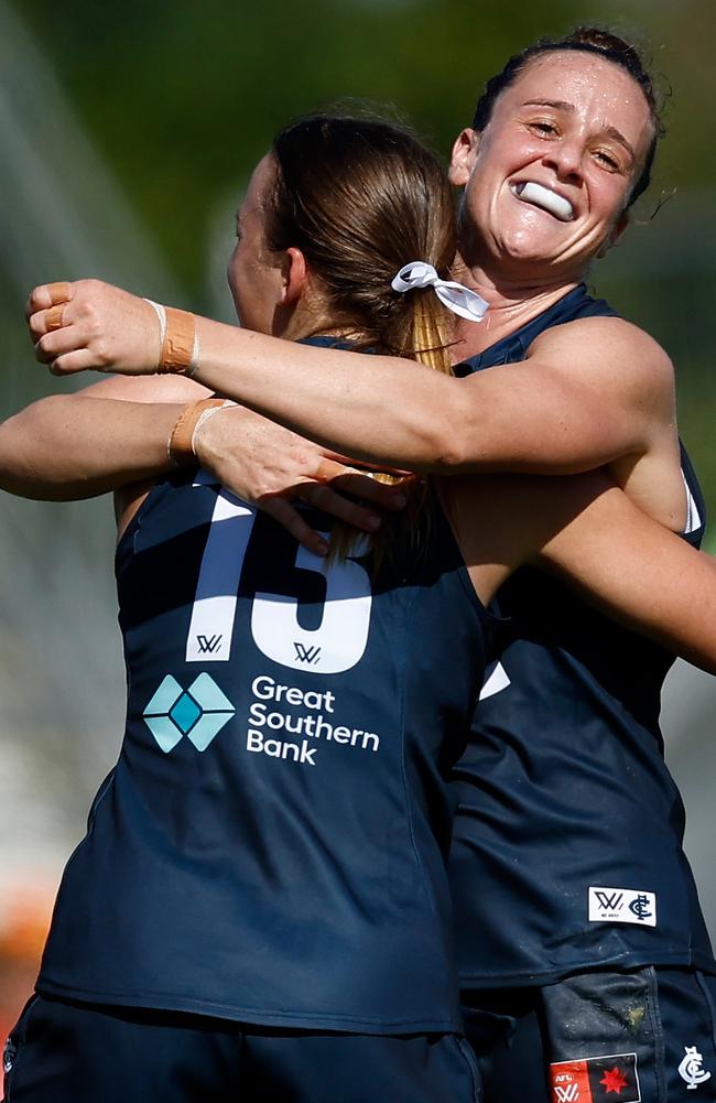 Harriet Cordner (right) celebrates with Carlton teammate Lulu Beatty during the Blues’ one-point win over Gold Coast in Mackay. Picture: Michael Willson / Getty Images