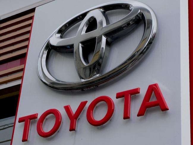 The logo of Japanâs Toyota Motor is displayed at a car showroom in Tokyo on August 4, 2022. (Photo by Kazuhiro NOGI / AFP)