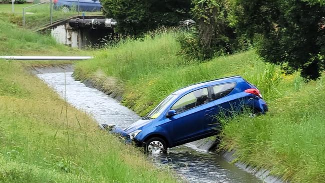 Car stuck in water filled ditch. Picture – Facebook.