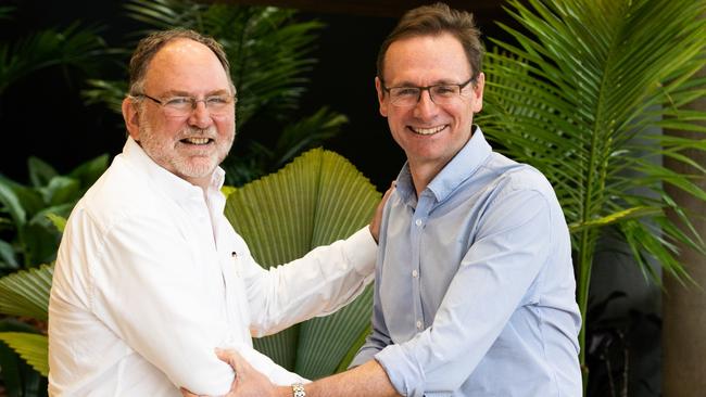 Outgoing TTNQ Chair and Chairman of Skyrail Rainforest Cableway Ken Chapman with new chairman John O'Sullivan. Picture: Supplied