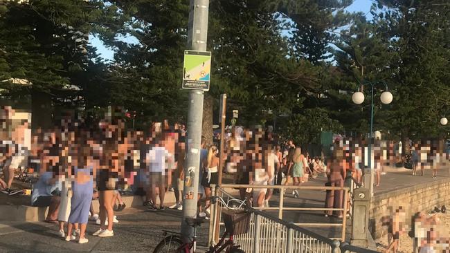 Revellers on East Esplanade, Manly, late on Saturday afternoon. There is no suggestion that anyone in this photograph is drinking illegally. Picture: Supplied