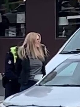 Bunnings Karen being handcuffed in the car park.