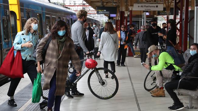 Flinders Street was quieter than usual, but still a hub of activity. Picture: David Crosling