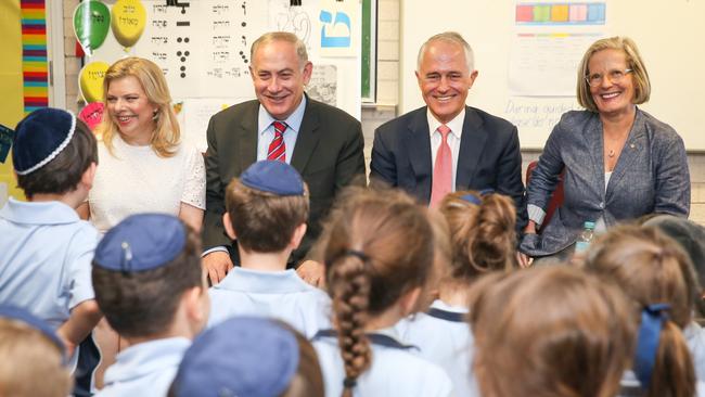 Israeli Prime Minister Benjamin Netanyahu and wife Sara, left, visit Moriah College in Queens Park, Sydney, with Malcolm and Lucy Turnbull yesterday. Picture: Renee Nowytarger