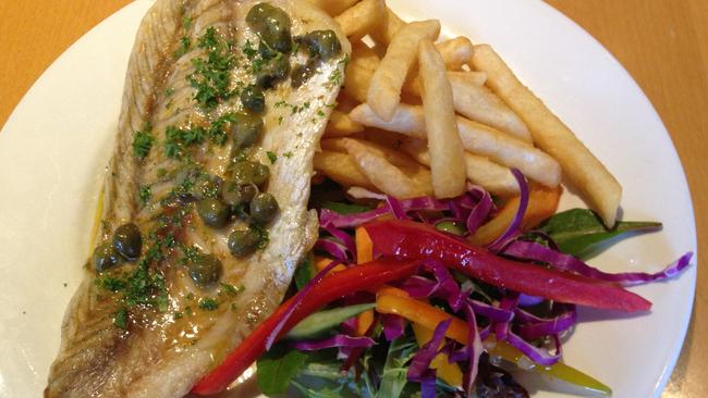 The barramundi is served with fries and fresh salad.