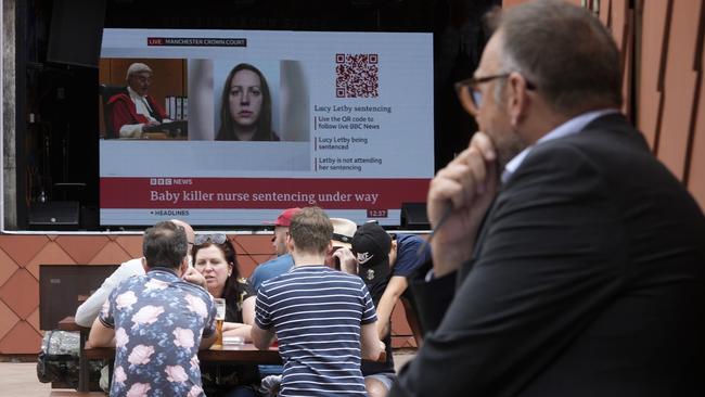 A television near Manchester Crown Court broadcasts the judge sentencing Lucy Letby in 2023. Picture: Getty Images