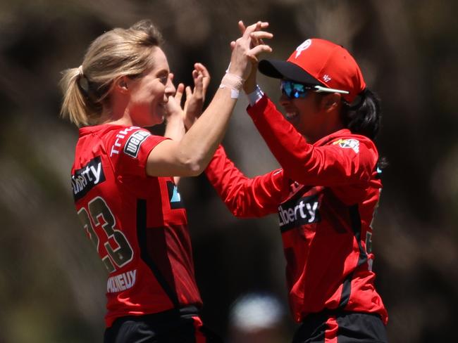 PERTH, AUSTRALIA - OCTOBER 30: Sophie Molineux and Jemimah Rodrigues of the Renegades celebrate the wicket of during the Women's Big Bash League match between the Melbourne Renegades and the Sydney Sixers at Lilac Hill, on October 30, 2021, in Perth, Australia. (Photo by Paul Kane/Getty Images)