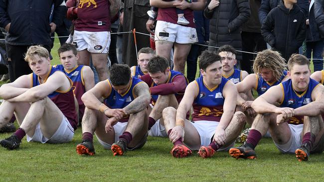 Dejected South Morang players after losing the Division 3 grand final. Picture: Andy Brownbill