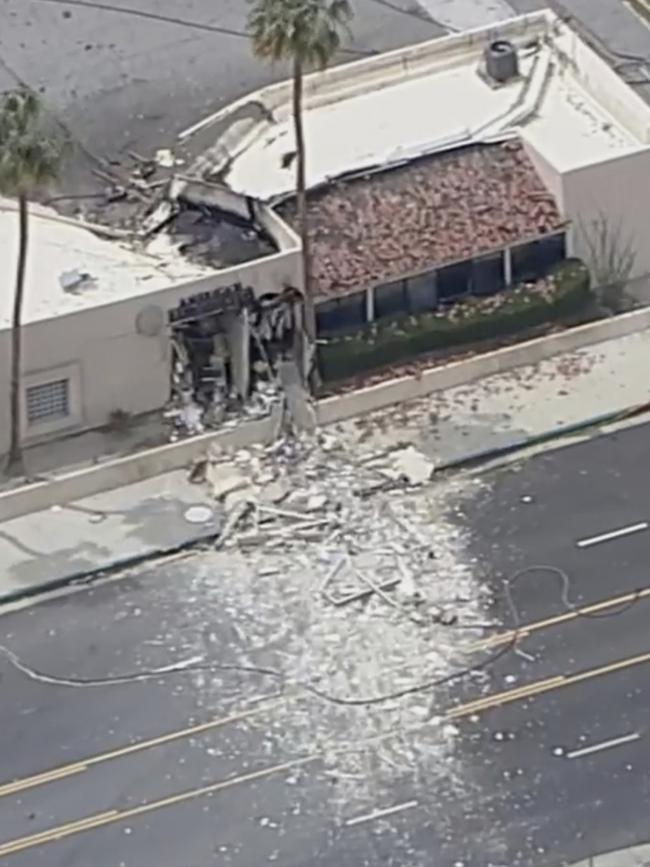 Debris covers the ground after an explosion on Saturday, May 17, 2025 in Palm Springs, Calif. (ABC7 Los Angeles via AP)