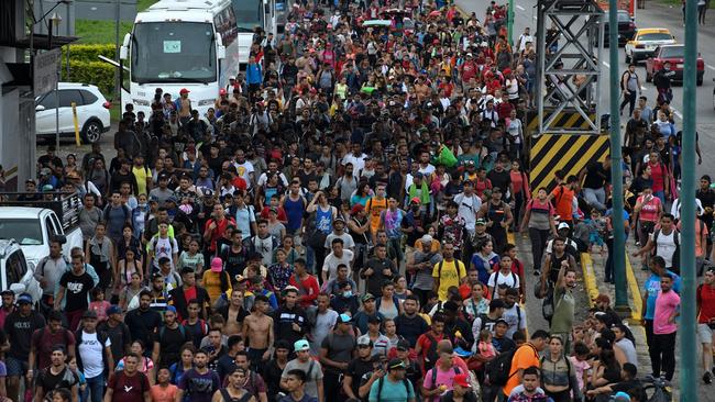 The latest Latin American migrant caravan passes through Huehuetan, Mexico, on its way towards the US border. Picture: AFP