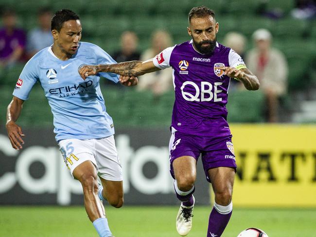 Kearyn Baccus for Melbourne City and Diego Castro of the Perth Glory during the Round 7 A-League match between Perth Glory and Melbourne City at NIB Stadium in Perth, Saturday, December 8, 2018. (AAP Image/Tony McDonough) NO ARCHIVING, EDITORIAL USE ONLY