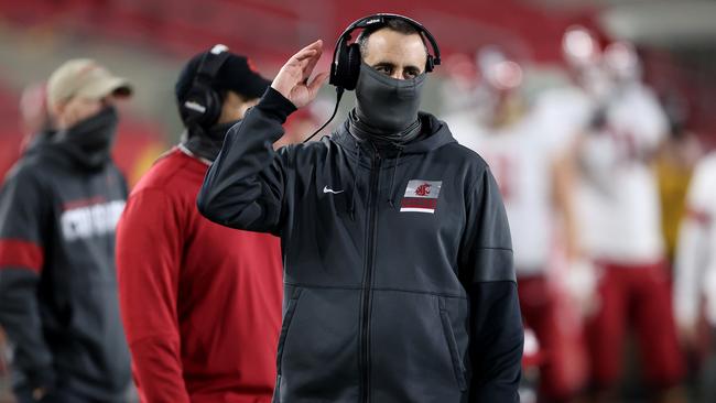 LOS ANGELES, CALIFORNIA - DECEMBER 06: Head coach Nick Rolovich of the Washington State Cougars looks on during the second half of a game against the USC Trojans at Los Angeles Coliseum on December 06, 2020 in Los Angeles, California. (Photo by Sean M. Haffey/Getty Images)