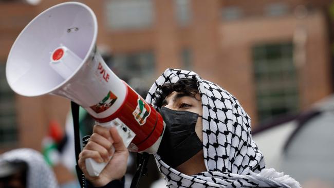 Activists and students protest on the outskirts of an encampment protest at the University Yard at George Washington University in Washington, DC. Picture: Getty