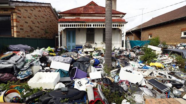 The property near Ewart St, Dulwich Hill, has piles of rubbish. Picture: Sam Ruttyn