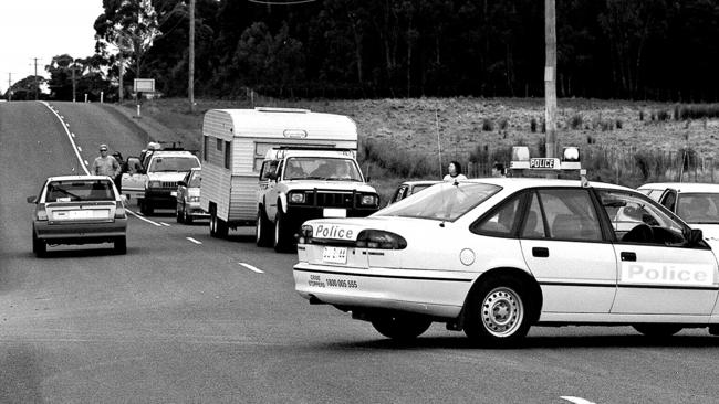 Police cars blocking road to the Broad Arrow cafe, Port Arthur