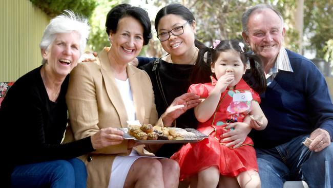 Vickie Chapman, second from left, with members of the Neighbourhood Watch program at the Warrego Cresent Reserve — Debbie Foreman, Crystal Wan and daughter Anna 3 and Garry Humphires. Picture: Tricia Watkinson