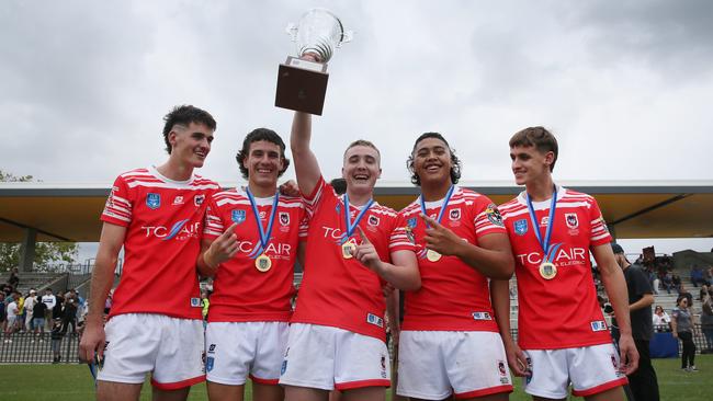 Winners are grinners. The victorious Illawarra South Coast Dragons. Picture: Sue Graham